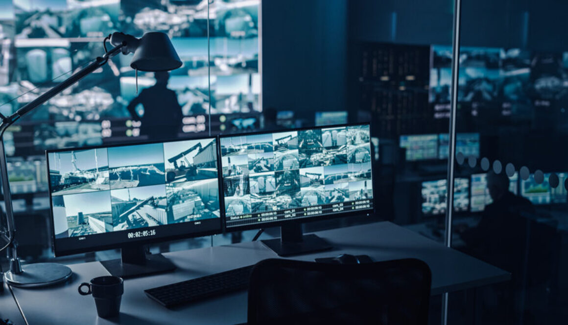 Two Digital Computer Screens with Surveillance CCTV Video in a H