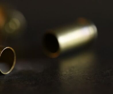 Bullet cartridges on the floor. 4k resolution video footage.